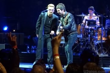 Noel Galager i Bono Voks/Photo> ZouTube printscreen