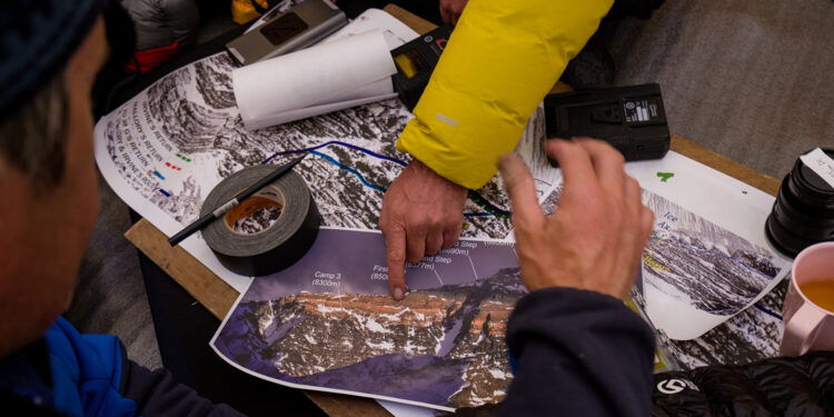 Team members map out a plan to climb the North side of Mt. Everest in search of Sandy Irvine's remains. (National Geographic/Renan Ozturk)